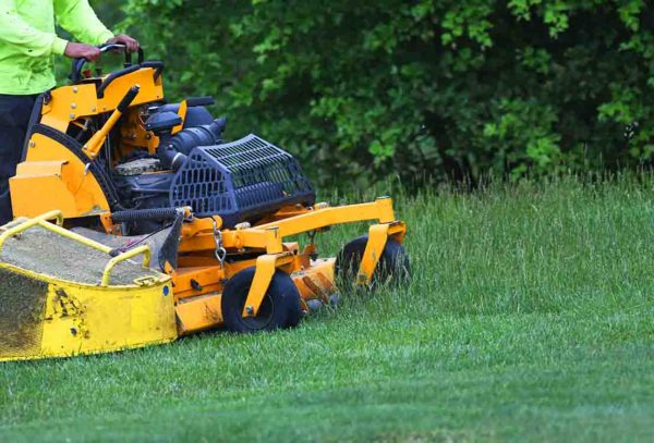 man on riding mower